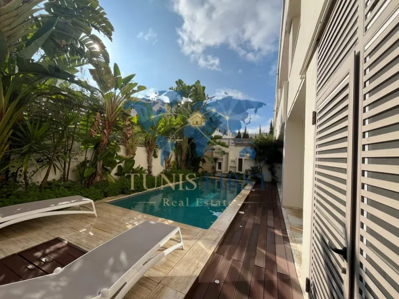 A vendre appartement S+2 avec jardins et piscine à Gammarth